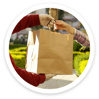 Hungry woman passing brown paper bag